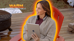 Woman sitting outside holding an iPad